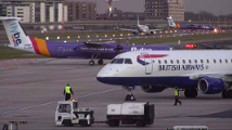 A view of the runway including an aeroplane