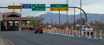 A vehicle checkpoint at a border crossing